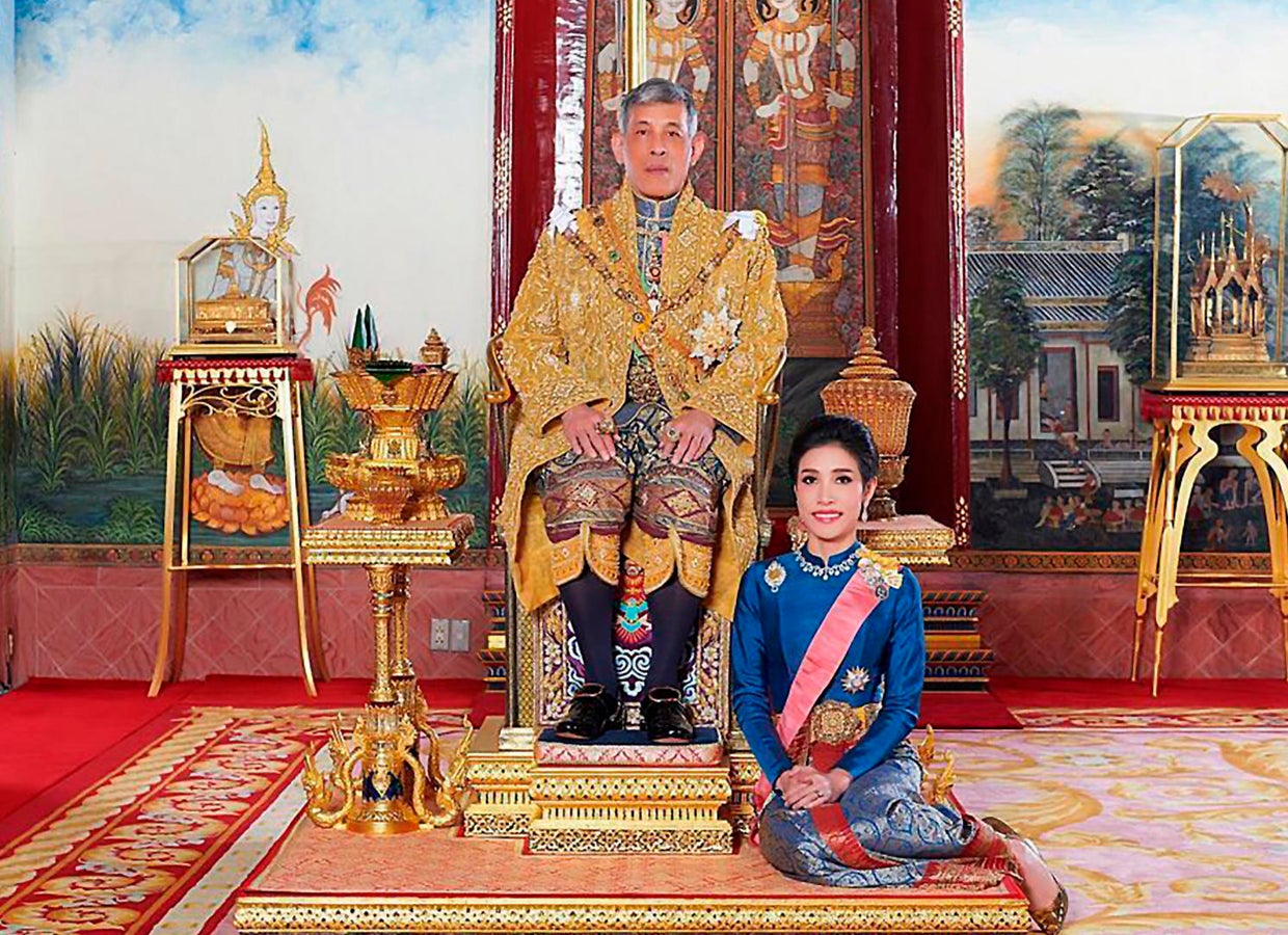 This undated photo posted Monday, Aug. 26, 2019 on the Thailand Royal Office website shows King Maha Vajiralongkorn with Major General Sineenatra Wongvajirabhakdi, the royal noble consort
